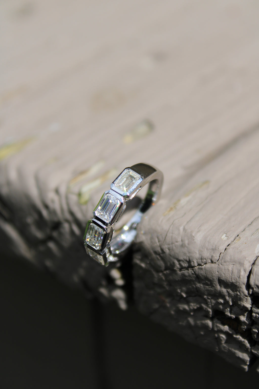 18kwg 2.05ctw Emerald Cut Diamond Bezel Band