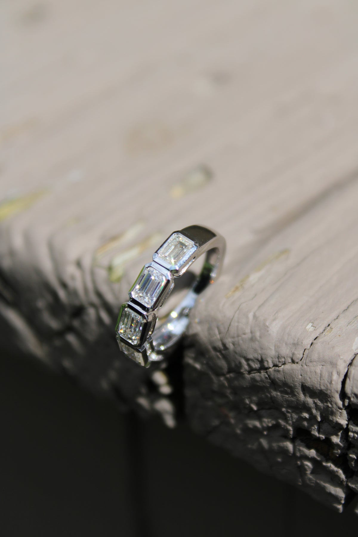 18kwg 2.05ctw Emerald Cut Diamond Bezel Band