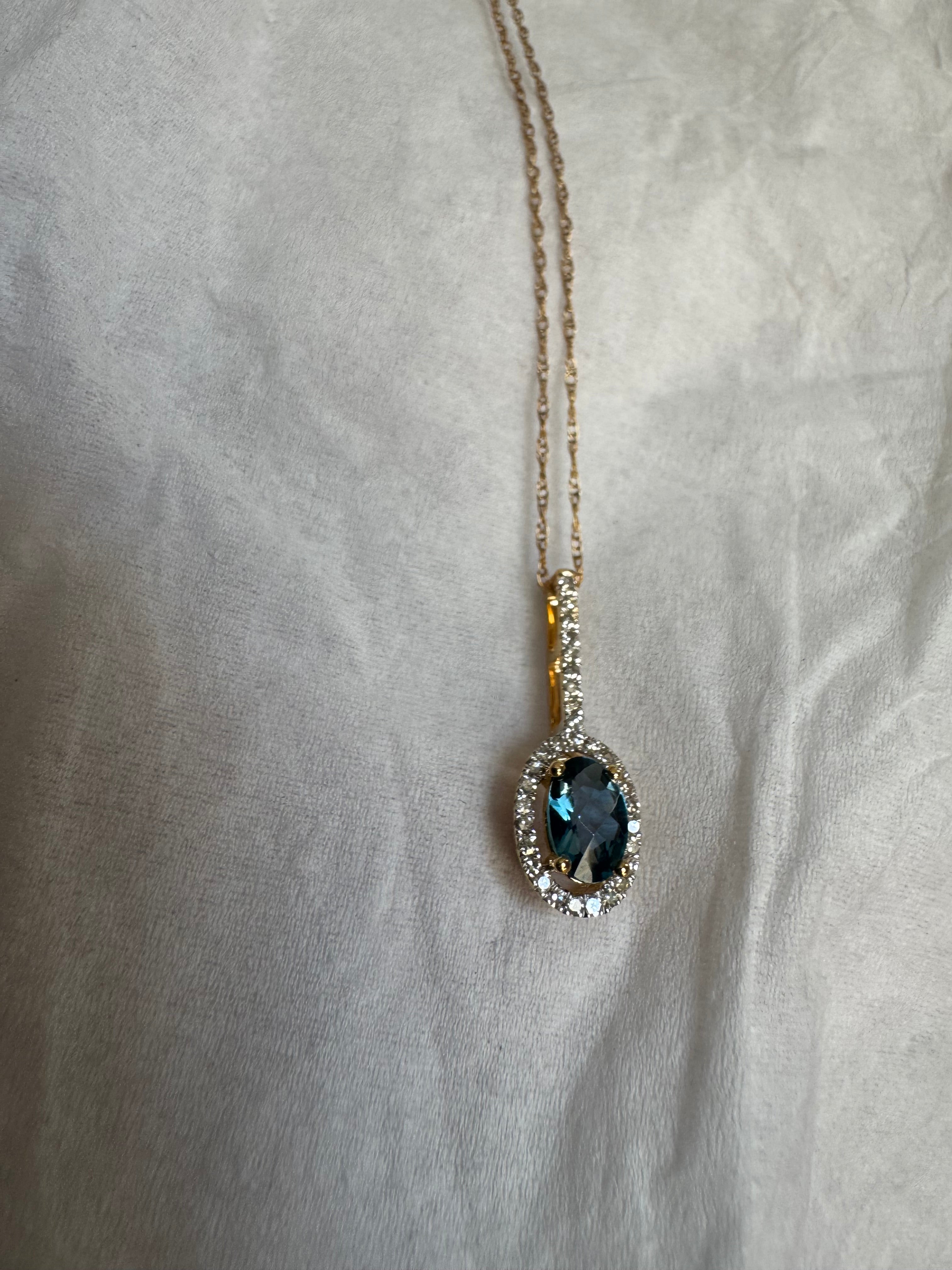 Blue Topaz & Diamond .09ctw Necklace 14ky